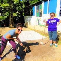 Volunteers doing building maintenance