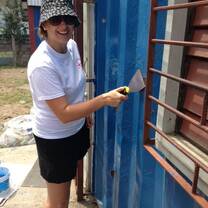 Volunteers doing building maintenance