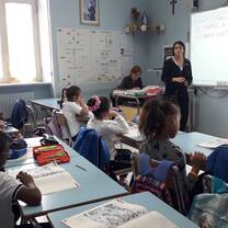 Volunteer at work with children