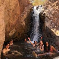Students in the waterfall