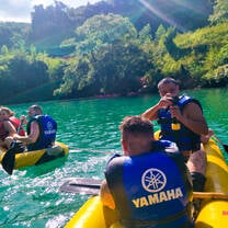 Backpacking Bali group on canoes