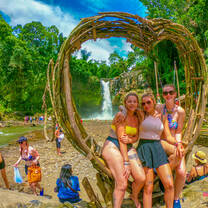 Backpacking Bali members at waterfall