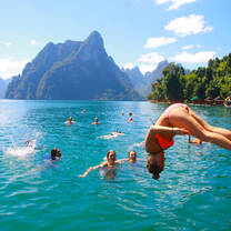 Backpacking Thailand group hanging at island