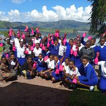Group of school-going girls with Happy Girls Project's health kit