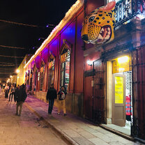 A Mexican street lit up at night