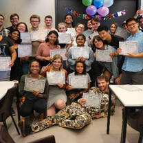 teachers pose with tefl certificates