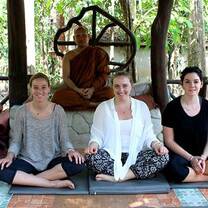 teachers pose for a photo during meditation