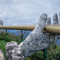 Visit the Golden Bridge in Vietnam in Da Nang at the Bà Nà Hills.