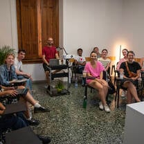 Studnets smiling for a picture while in their Italian classroom course