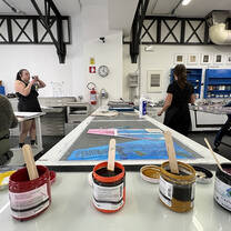 Inks in the printmaking studio lined up for printing