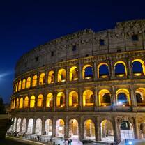 A picture of the Collesseum lit up at night 