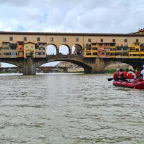 CET Florence students inside a boat at the Arno River in Florence, Italy