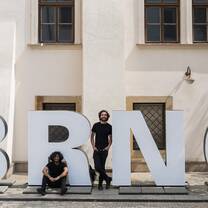 Students with Brno sign
