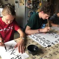 kids writing in mandarin