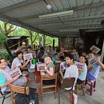 kids smiling at the table