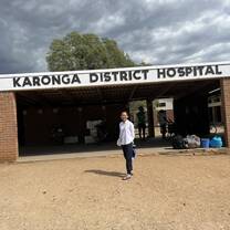 woman standing in front of a local hospital