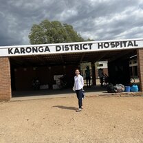 woman standing in front of a local hospital