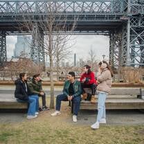 Students gathered under Williamsburg Bridge