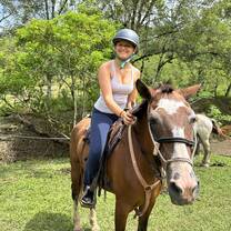 Student riding a horse