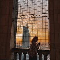 Girl watching sunset in Warsaw
