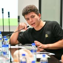 Student speaking in a Off-campus visit to the Mainland Affairs Council