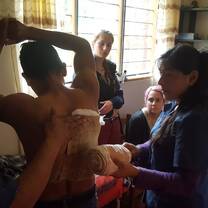 Treating patients at the Andean medicine clinic