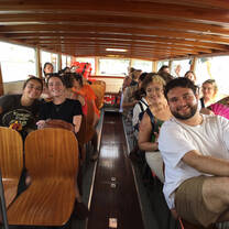 Students enjoying the bus ride on field trip.