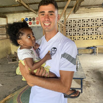 Volunteer with baby