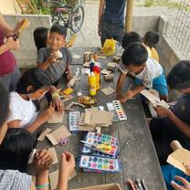 Painting together at table