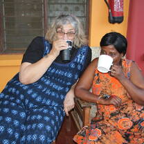 Volunteer enjoying tea with Headmistress