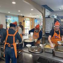 Volunteers serving food
