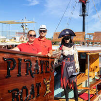 2 crew members smiling on boat