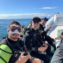a group selfie on a boat 