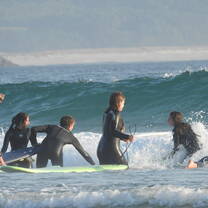 students learning to surf