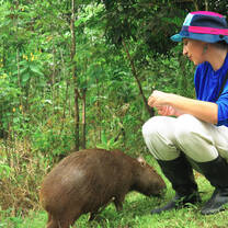 student with a capybara
