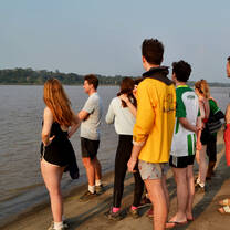students standing on a beach