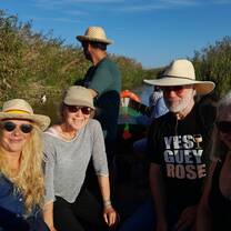 group smiling on a hike