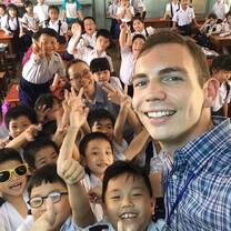 Selfie of teacher with students 