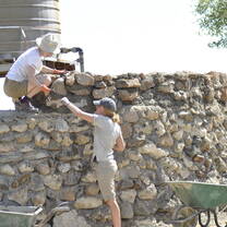 two volunteers in elephant conservation