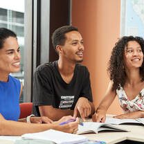 students studying at a table