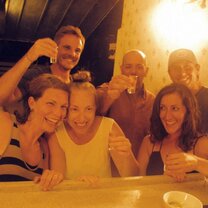 group smiling with drinks 