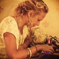 girl fiddling with something on a table