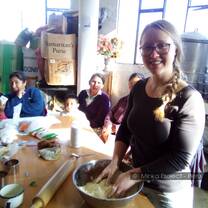 volunteer teaching women to cook