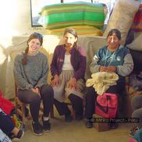 volunteer with the women of the project