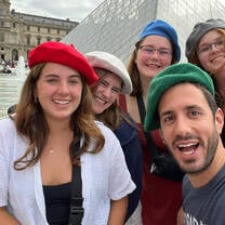 EF Gap Year students with their Tour Director outside the Louvre