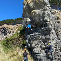 Rock climbing at Longbeach in Dunedin