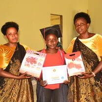 three mothers smiling with certificates