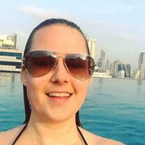 selfie of an female intern in front of a pool