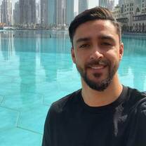 selfie of an male intern in front of a pool