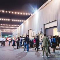 students at a large event venue